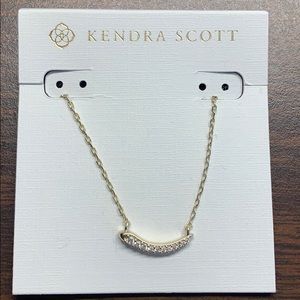Kendra Scott necklace in gold with rhinestones.
